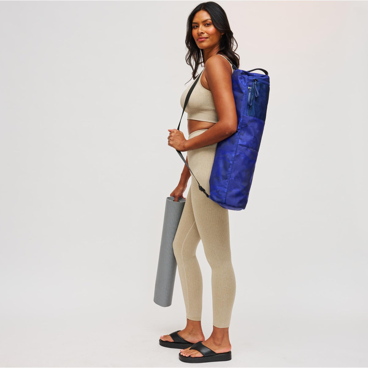Woman wearing Blue Camo Sol and Selene Karma -- Camo Print Yoga Mat Bag 841764100809 View 3 | Blue Camo
