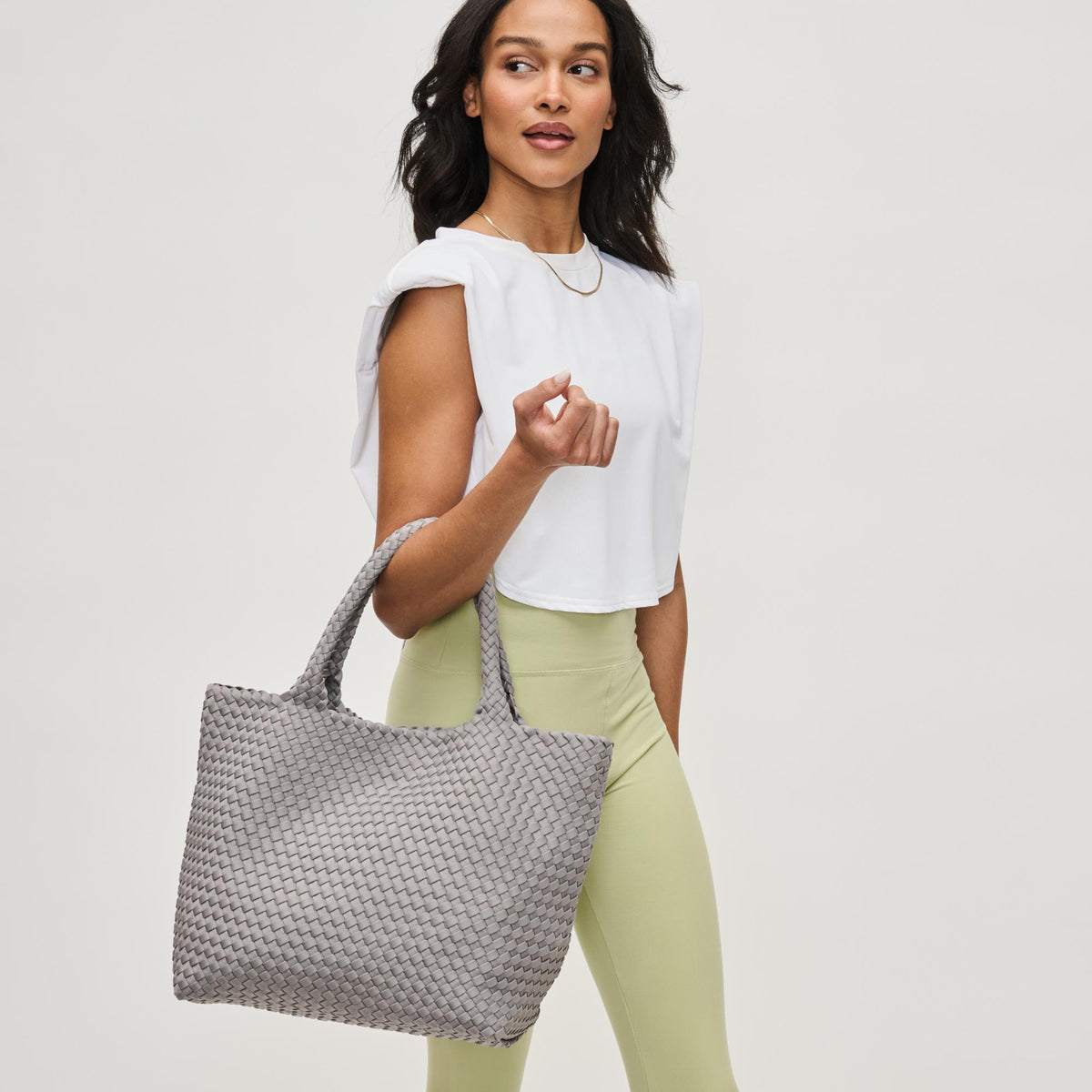 Woman wearing Fog Sol and Selene Sky's The Limit - Medium Tote 841764111300 View 1 | Fog