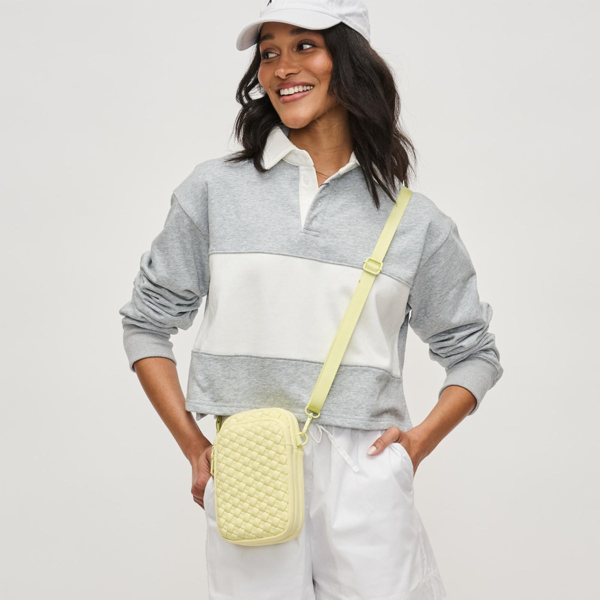 Woman wearing Butter Sol and Selene Divide & Conquer - Woven Neoprene Crossbody 841764111249 View 1 | Butter