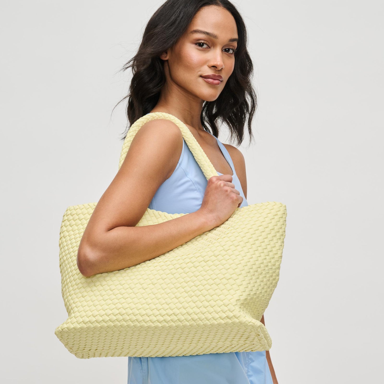 Woman wearing Nude Sol and Selene Sky's The Limit - Large Tote 841764107839 View 1 | Nude