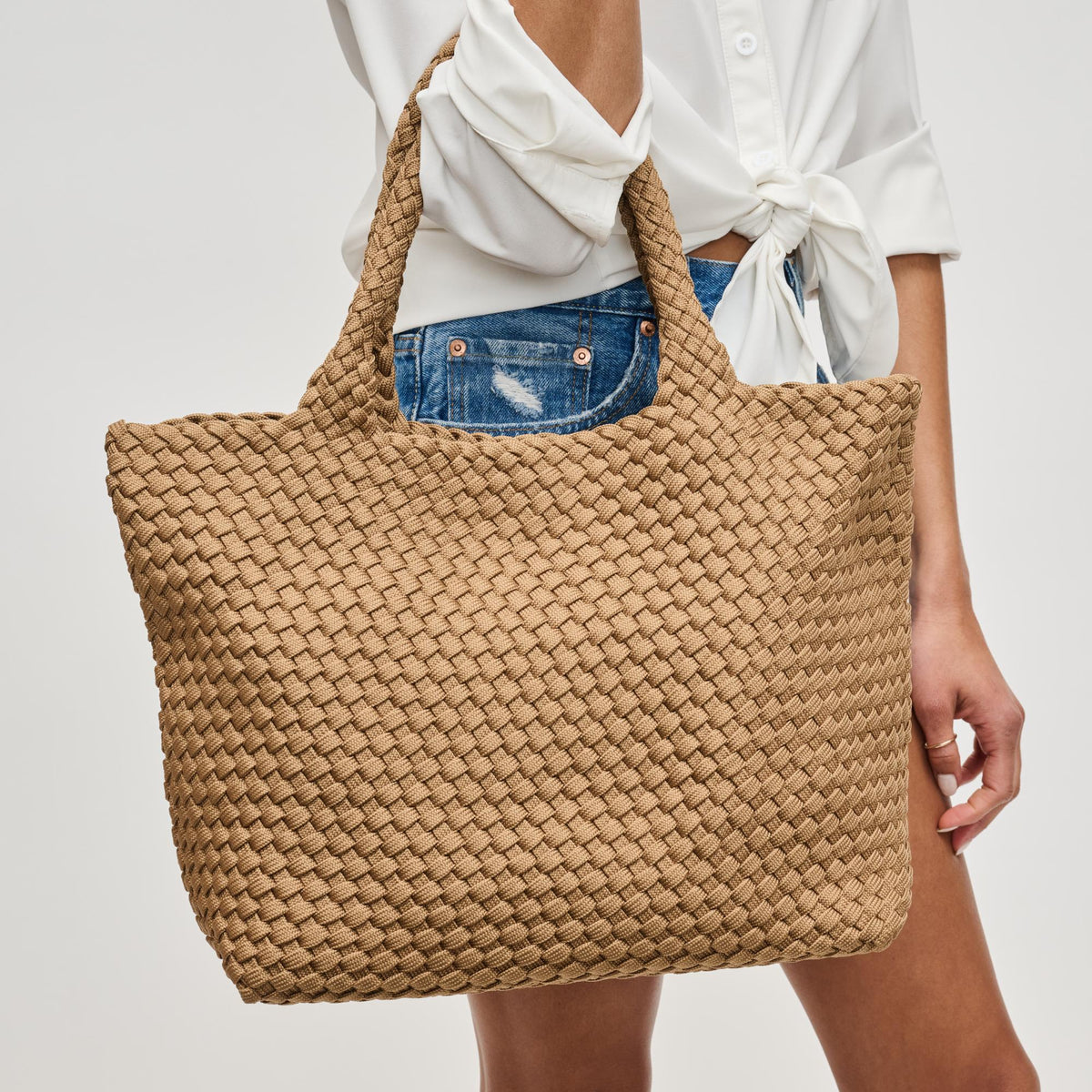 Woman wearing Nude Sol and Selene Sky's The Limit - Medium Laced Up Eco-Edition Tote 841764111621 View 4 | Nude