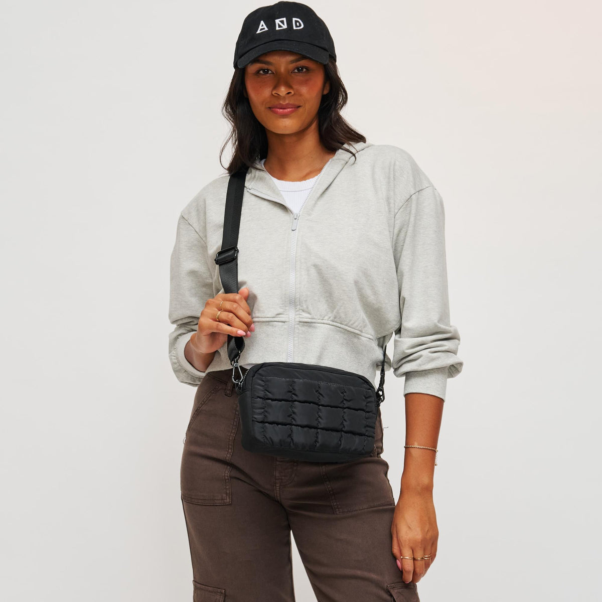 Woman wearing Black Sol and Selene Inspiration - Quilted Nylon Crossbody 841764108379 View 2 | Black