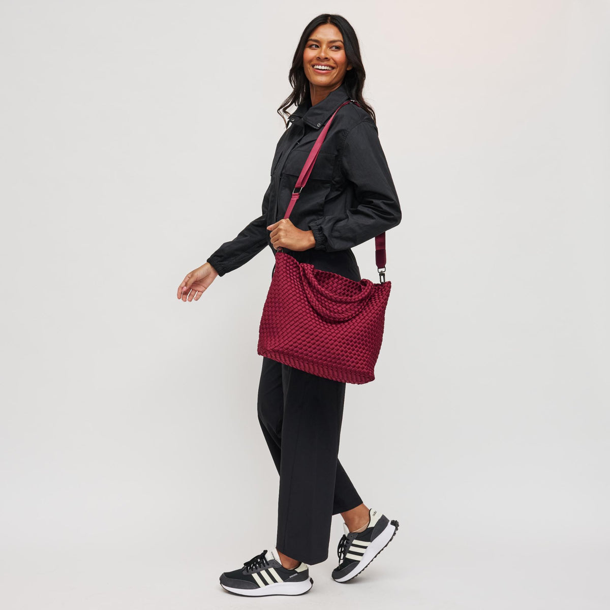 Woman wearing Wine Sol and Selene Sky's The Limit - Medium Tote 841764108850 View 4 | Wine
