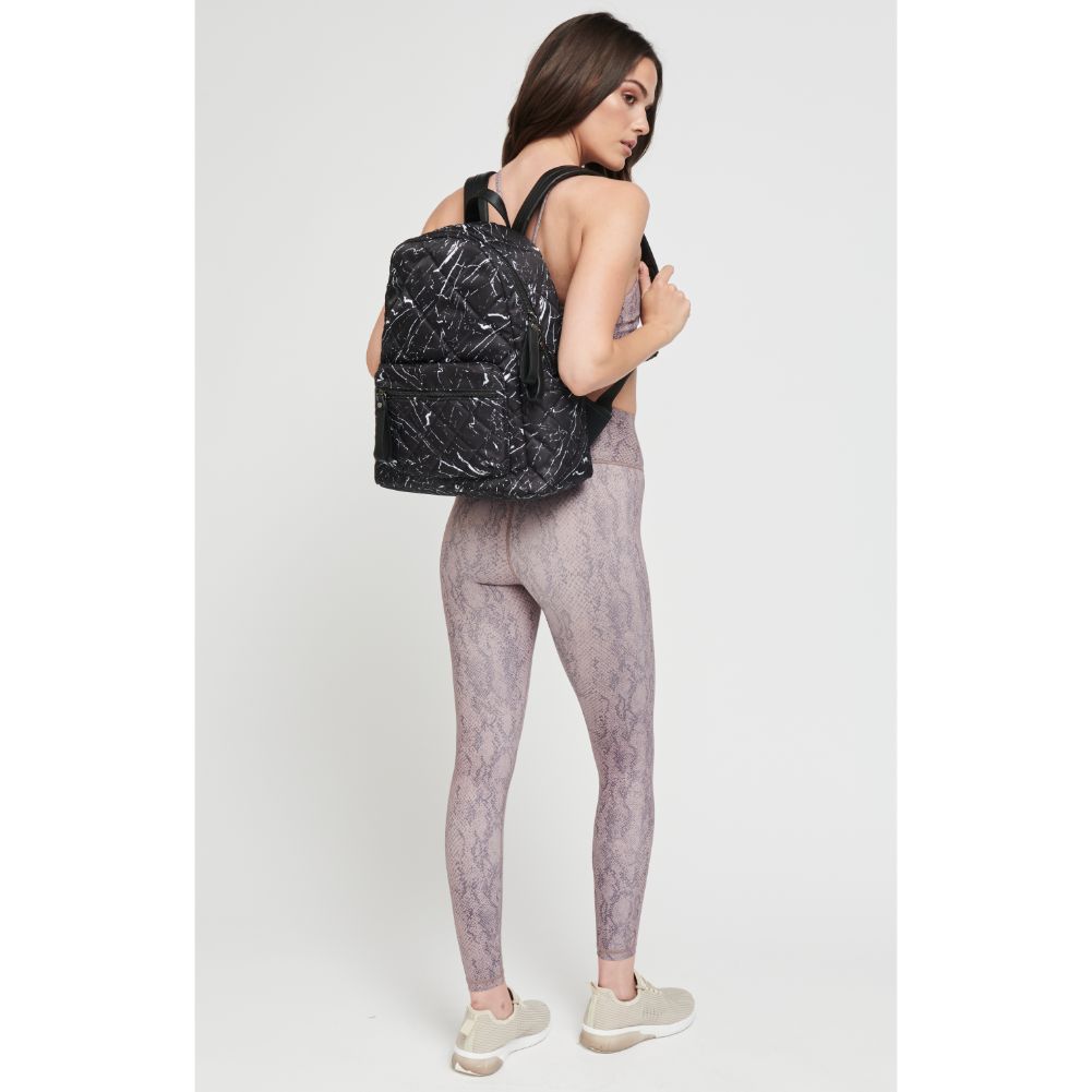 Woman wearing Black Marble Sol and Selene Motivator - Medium Backpack 841764105866 View 3 | Black Marble