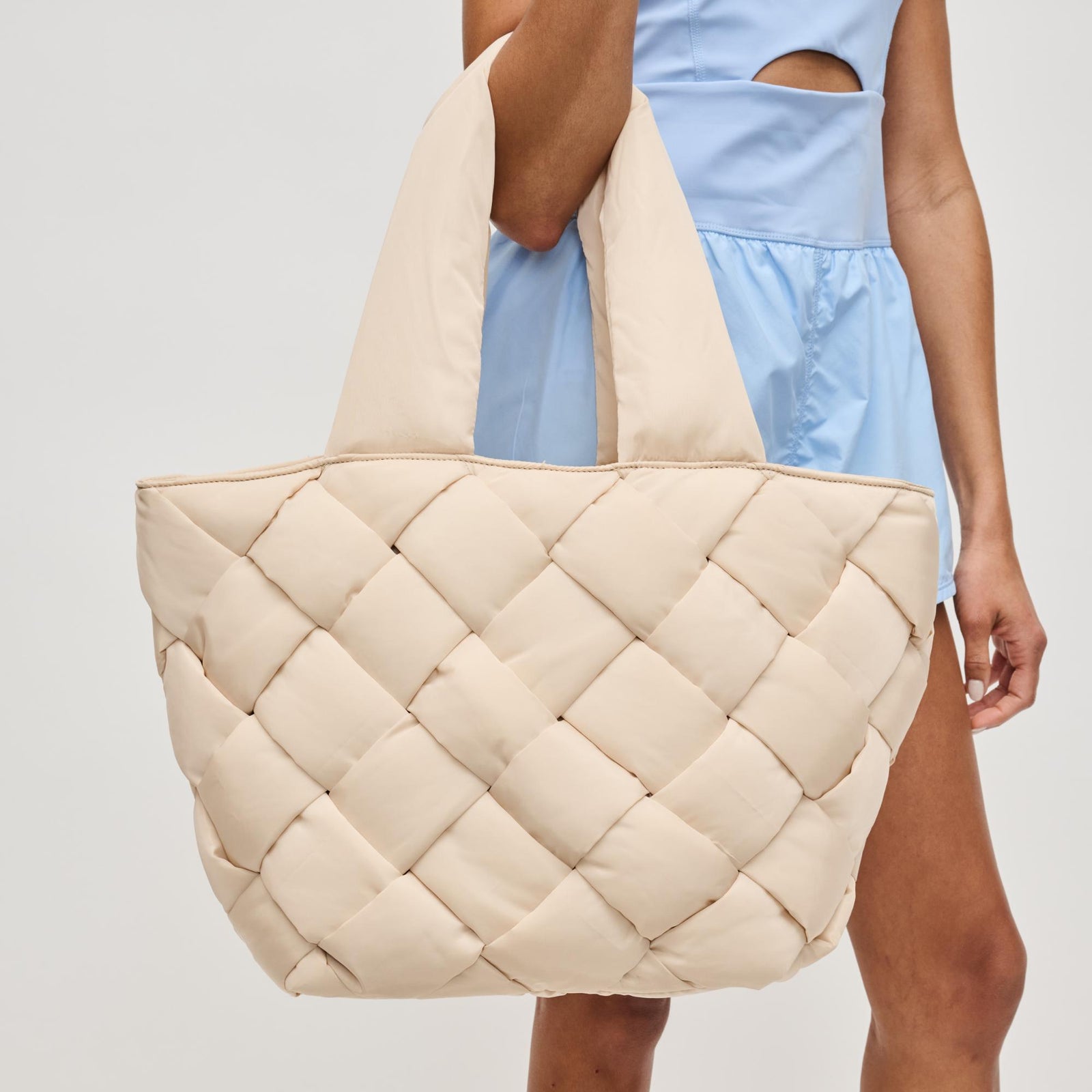 Woman wearing Black Sol and Selene Intuition East West Tote 841764107297 View 1 | Black