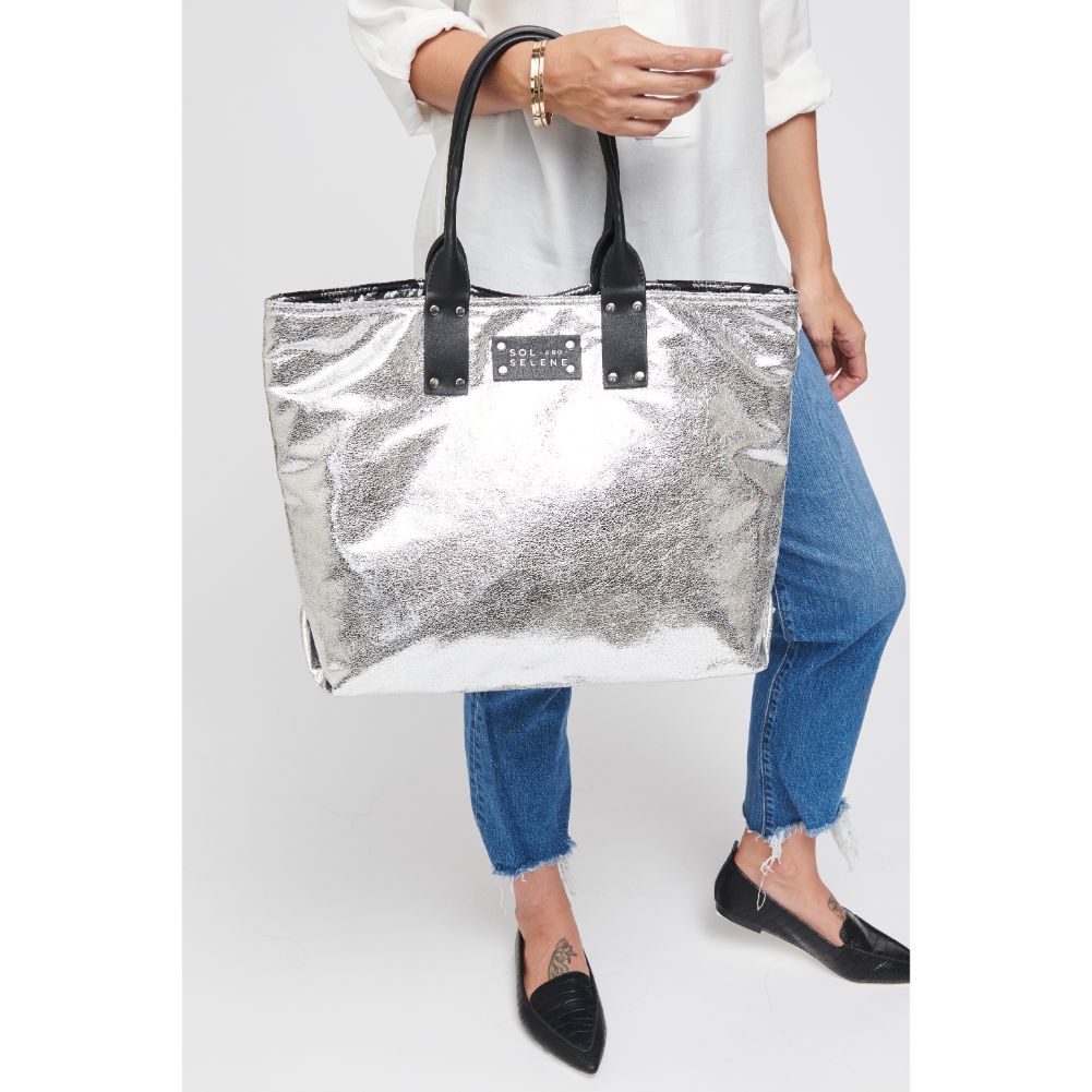 Woman wearing Silver Metallic Sol and Selene It Girl Tote 841764105095 View 1 | Silver Metallic