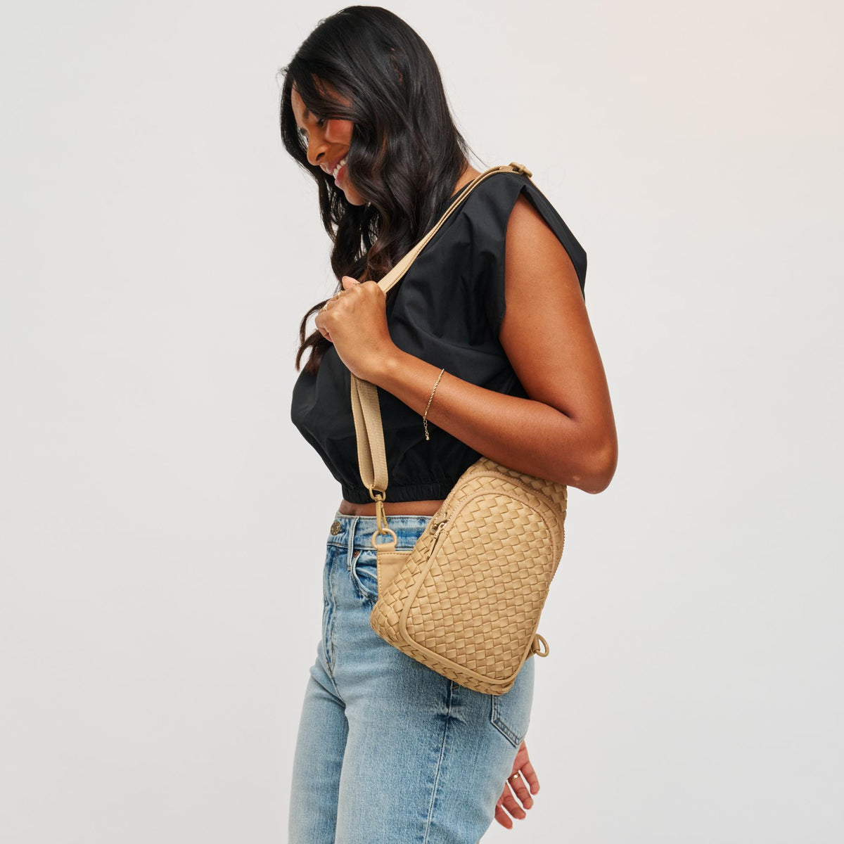 Woman wearing Nude Sol and Selene Beyond The Horizon - Woven Neoprene Sling Backpack 841764108041 View 2 | Nude