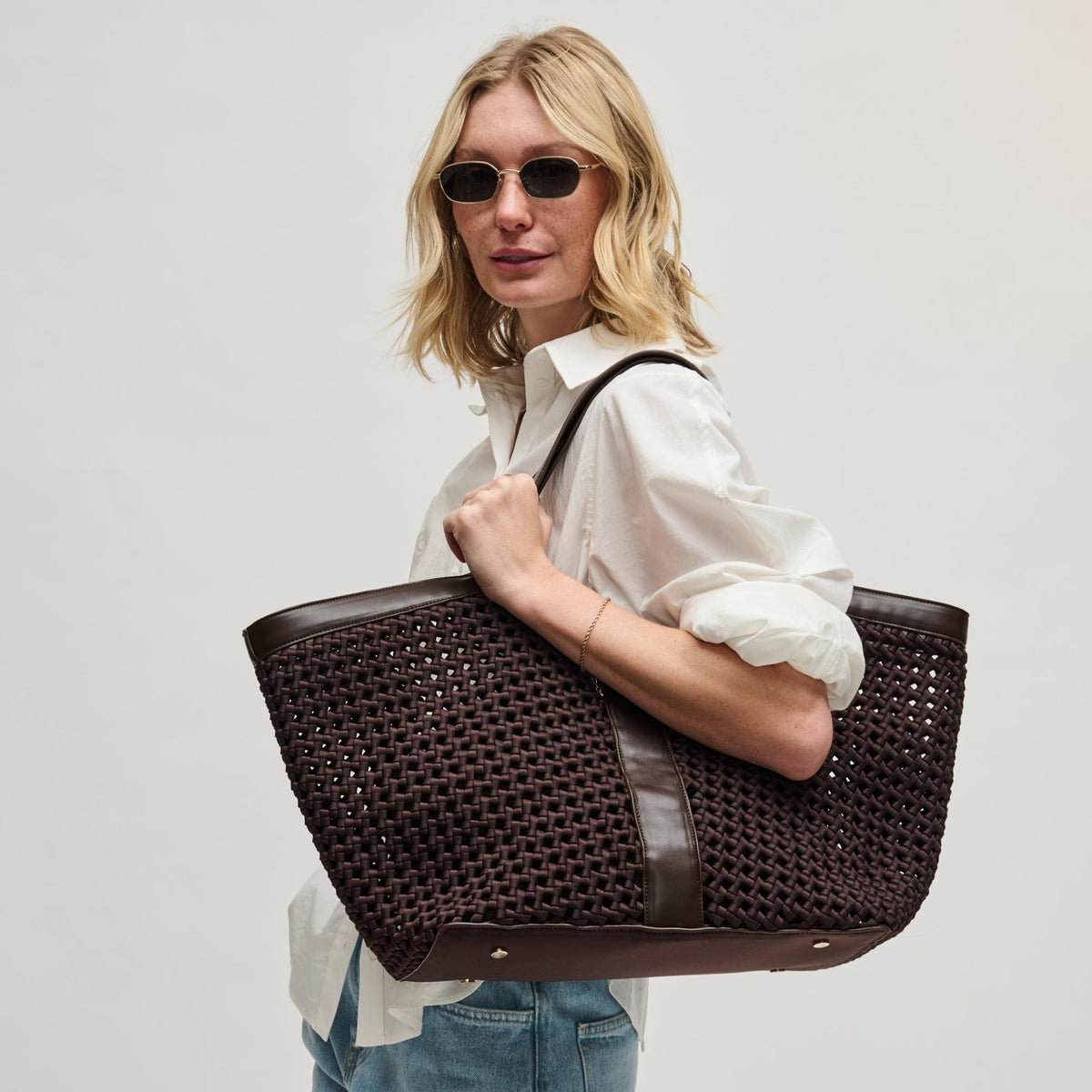 Woman wearing Chocolate Sol and Selene Calypso Tote 841764112918 View 2 | Chocolate