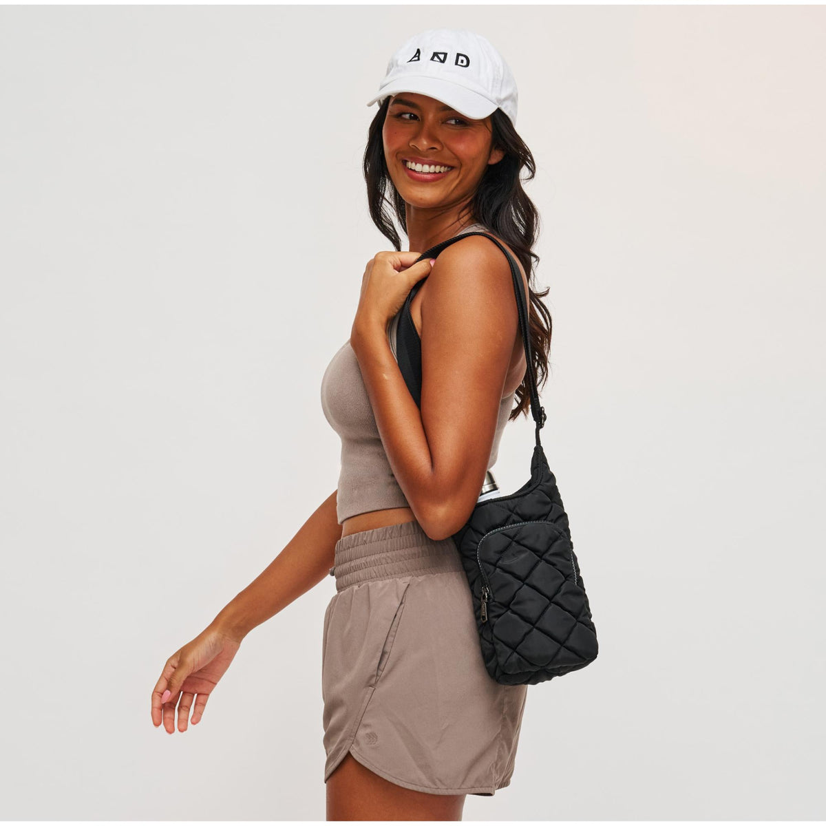 Woman wearing Black Sol and Selene Let It Flow - Puffer Crossbody 841764112062 View 1 | Black