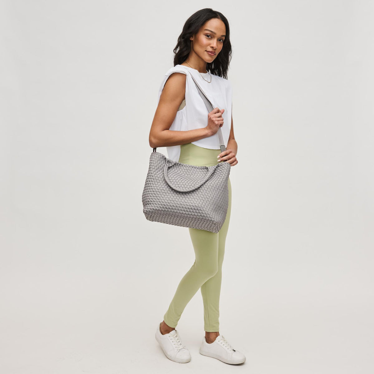 Woman wearing Fog Sol and Selene Sky's The Limit - Medium Tote 841764111300 View 3 | Fog