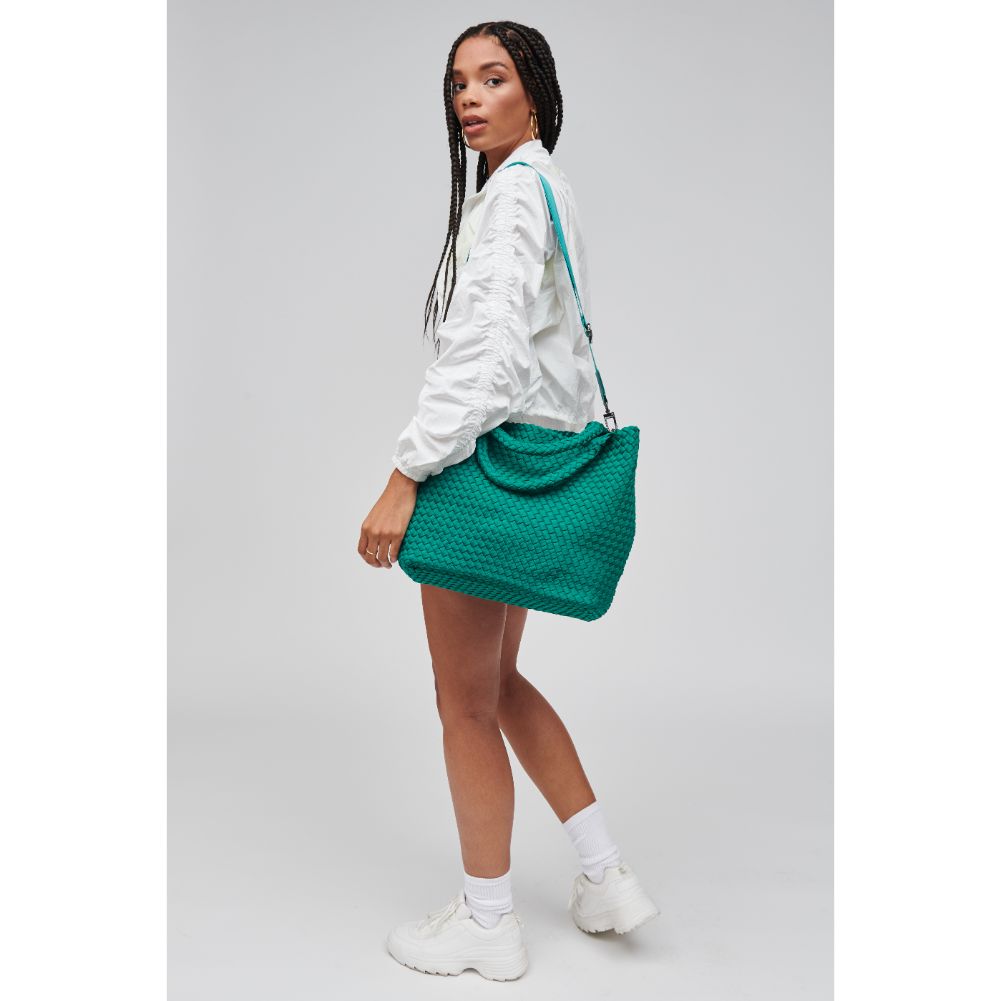 Woman wearing Emerald Sol and Selene Sky's The Limit - Medium Tote 841764107808 View 3 | Emerald