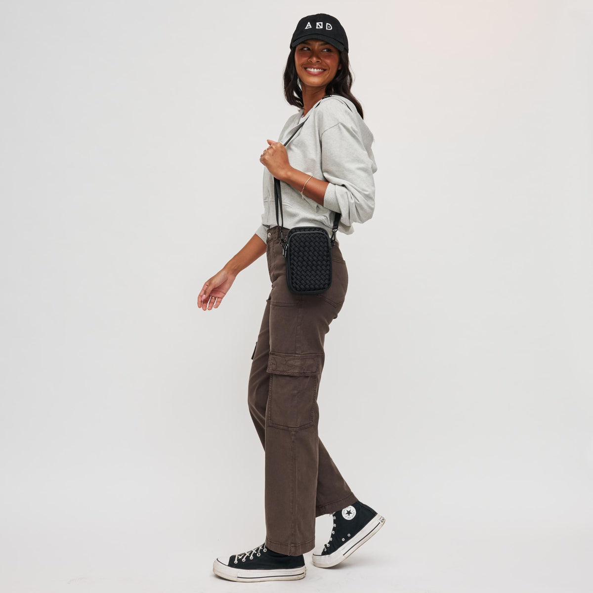 Woman wearing Black Sol and Selene Divide & Conquer - Woven Neoprene Crossbody 841764108706 View 3 | Black