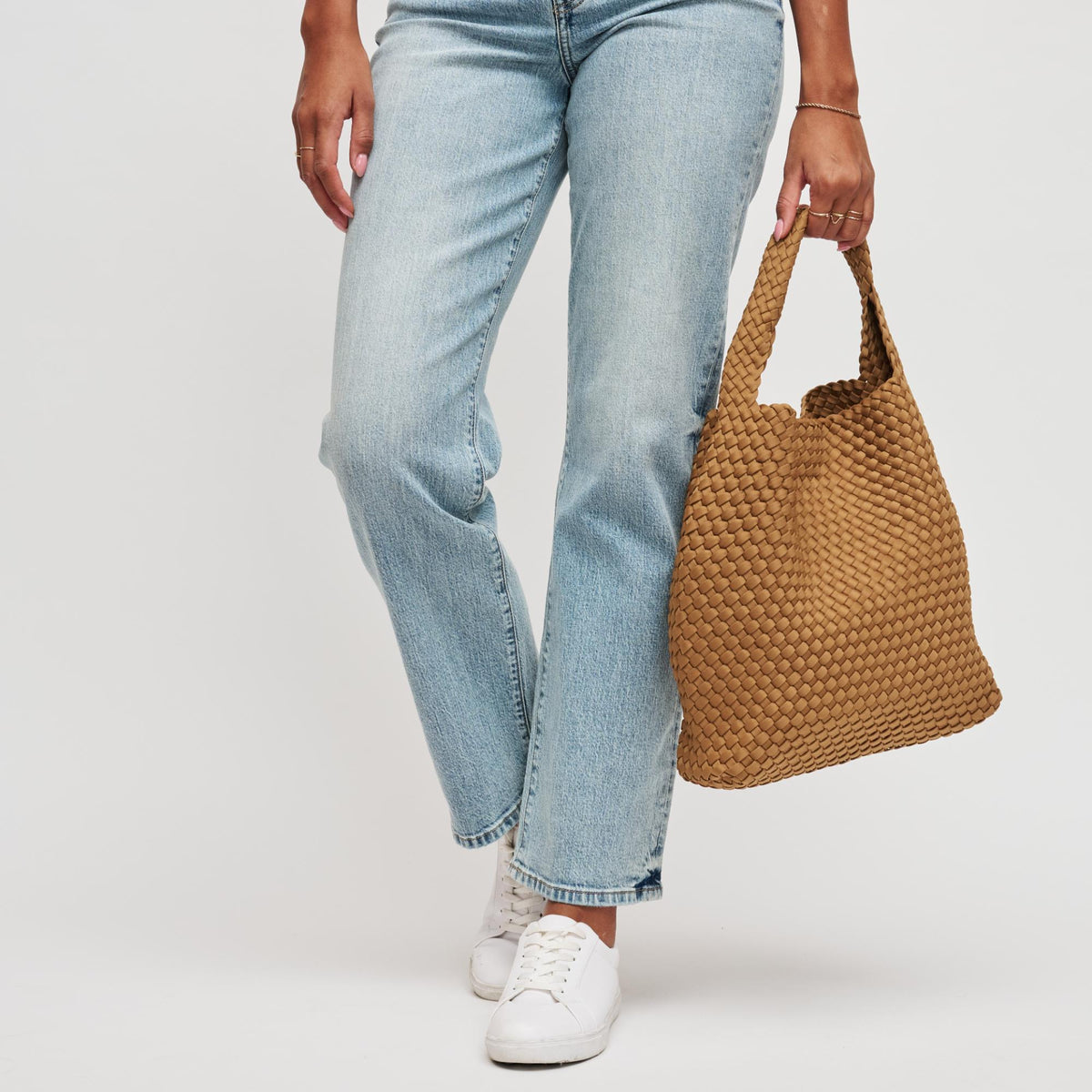 Woman wearing Sand Sol and Selene Celestial Woven Neoprene Hobo 841764112338 View 3 | Sand