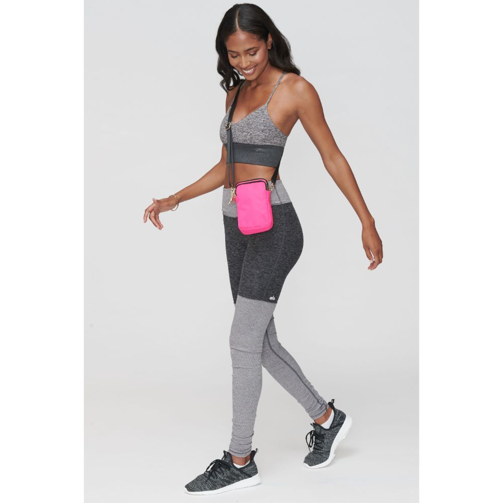 Woman wearing Neon Pink Sol and Selene Divide & Conquer Crossbody 841764104722 View 1 | Neon Pink