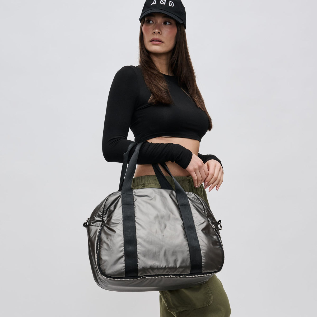 Woman wearing Gunmetal Sol and Selene Amplify Duffel 841764104869 View 3 | Gunmetal