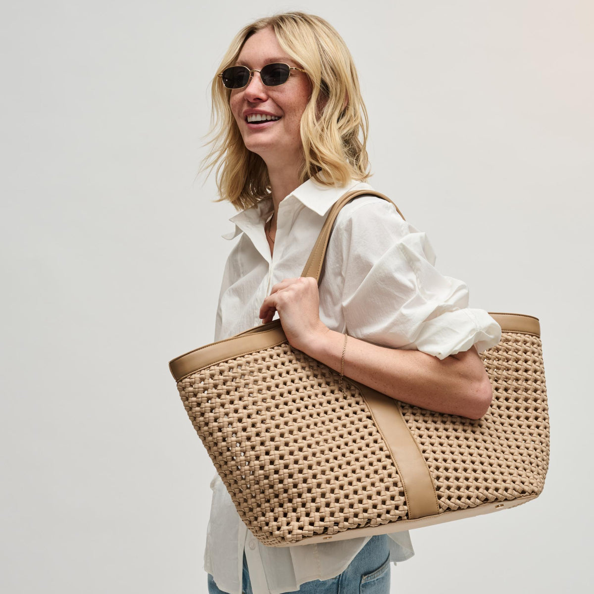 Woman wearing Nude Sol and Selene Calypso Tote 841764112970 View 1 | Nude