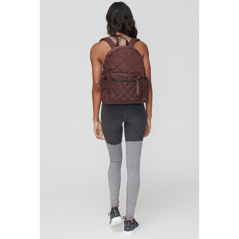 Woman wearing Eggplant Sol and Selene Motivator - Medium Backpack 841764100090 View 1 | Eggplant