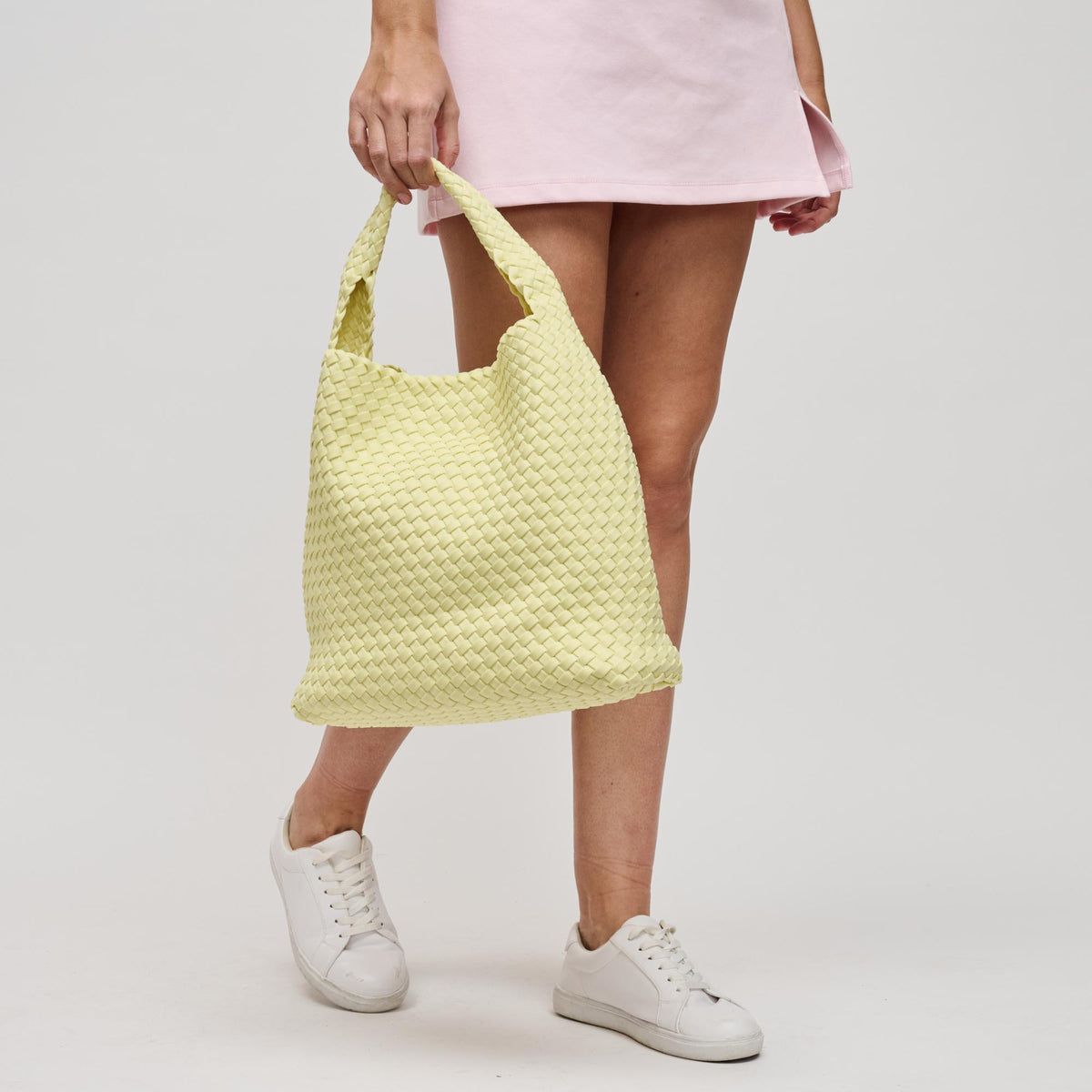 Woman wearing Butter Sol and Selene Celestial Woven Neoprene Hobo 841764112352 View 4 | Butter