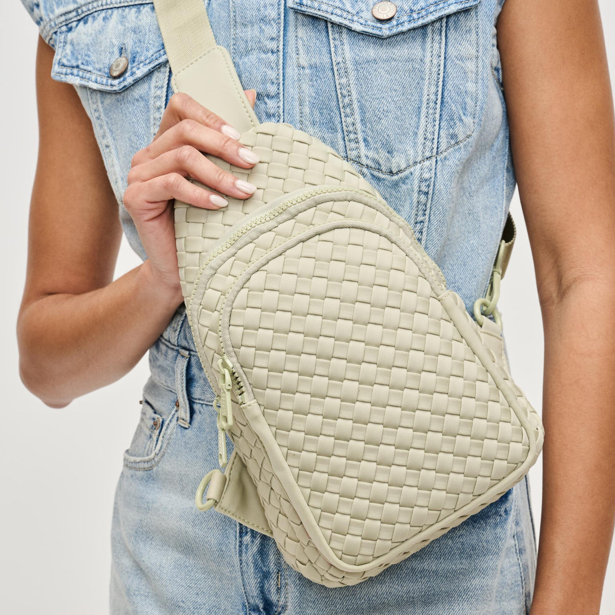 Woman wearing Sage Sol and Selene Beyond The Horizon - Woven Neoprene Sling Backpack 841764109086 View 1 | Sage