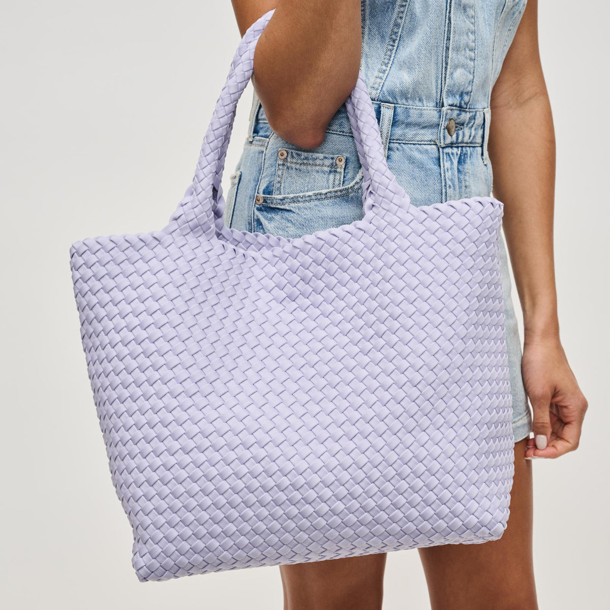 Woman wearing Lilac Sol and Selene Sky's The Limit - Medium Tote 841764111317 View 1 | Lilac
