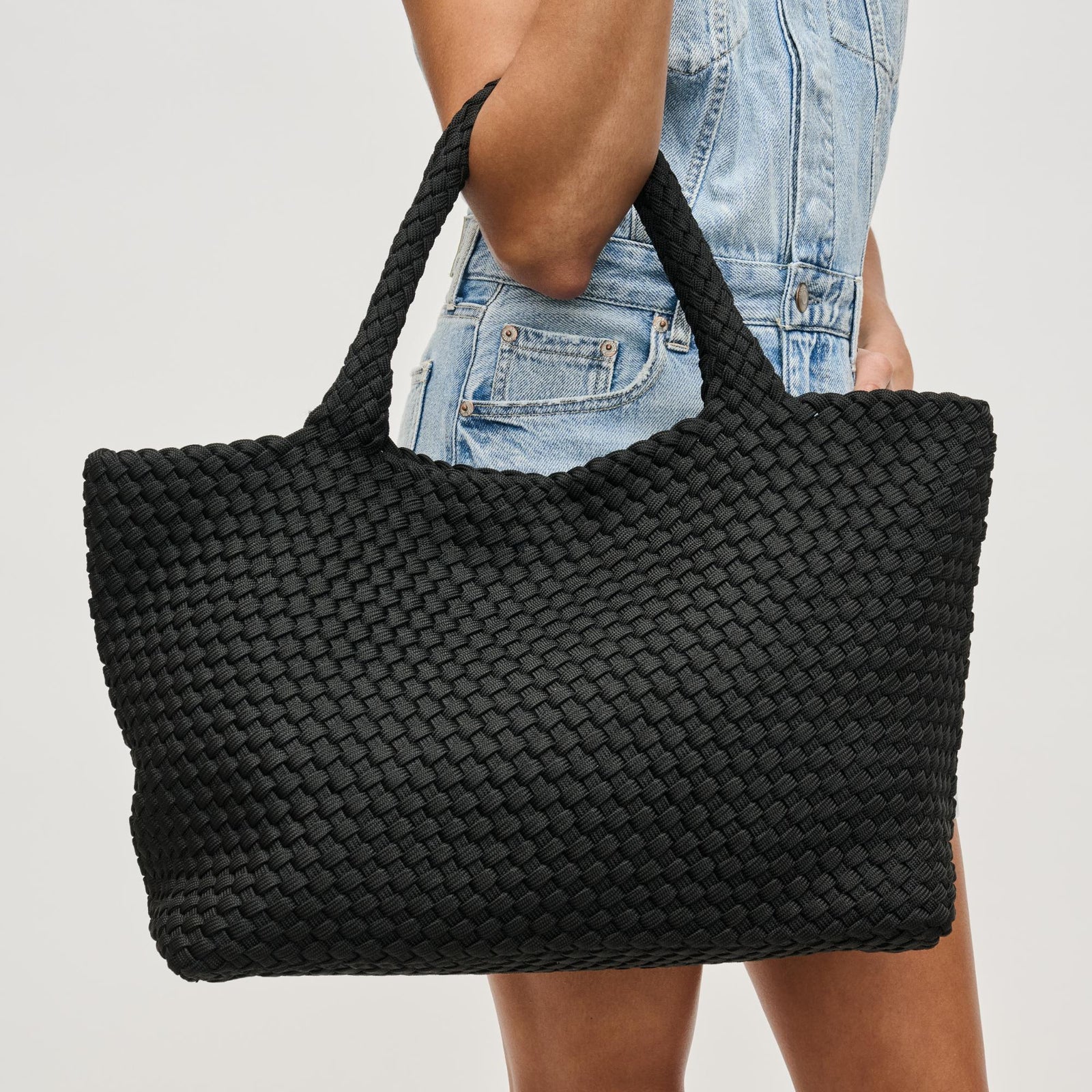 Woman wearing Navy Sol and Selene Sky's The Limit - Large Laced Up Eco-Edition Tote 841764111560 View 1 | Navy
