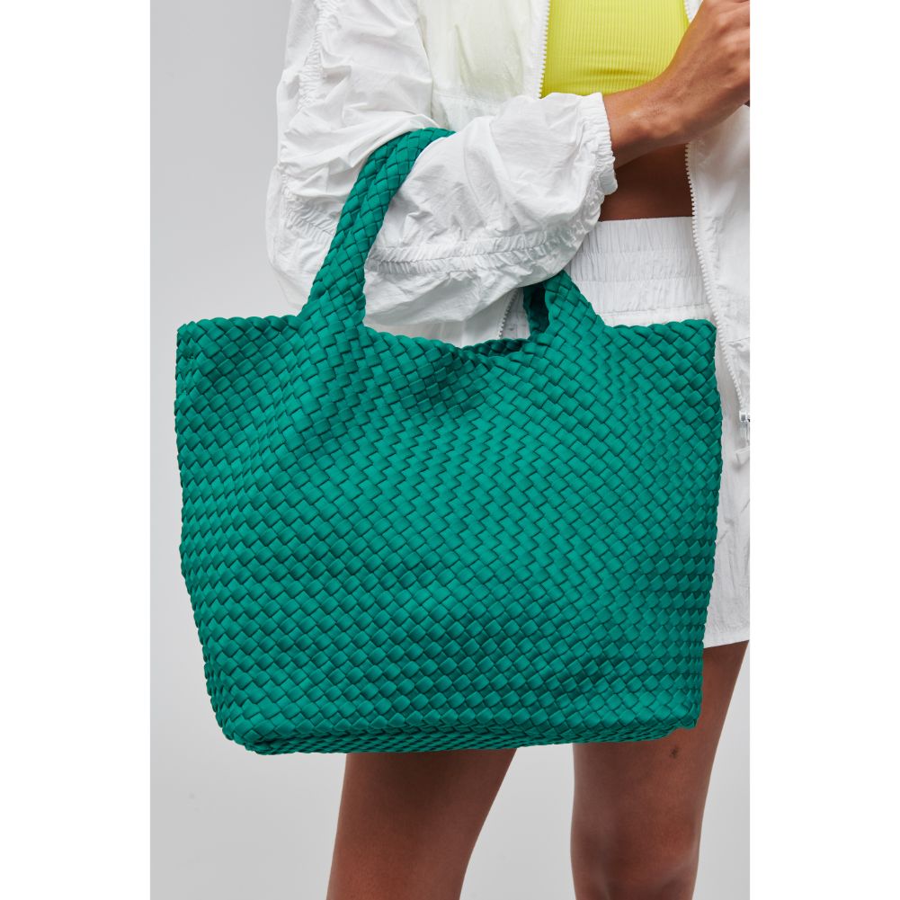 Woman wearing Emerald Sol and Selene Sky's The Limit - Medium Tote 841764107808 View 1 | Emerald