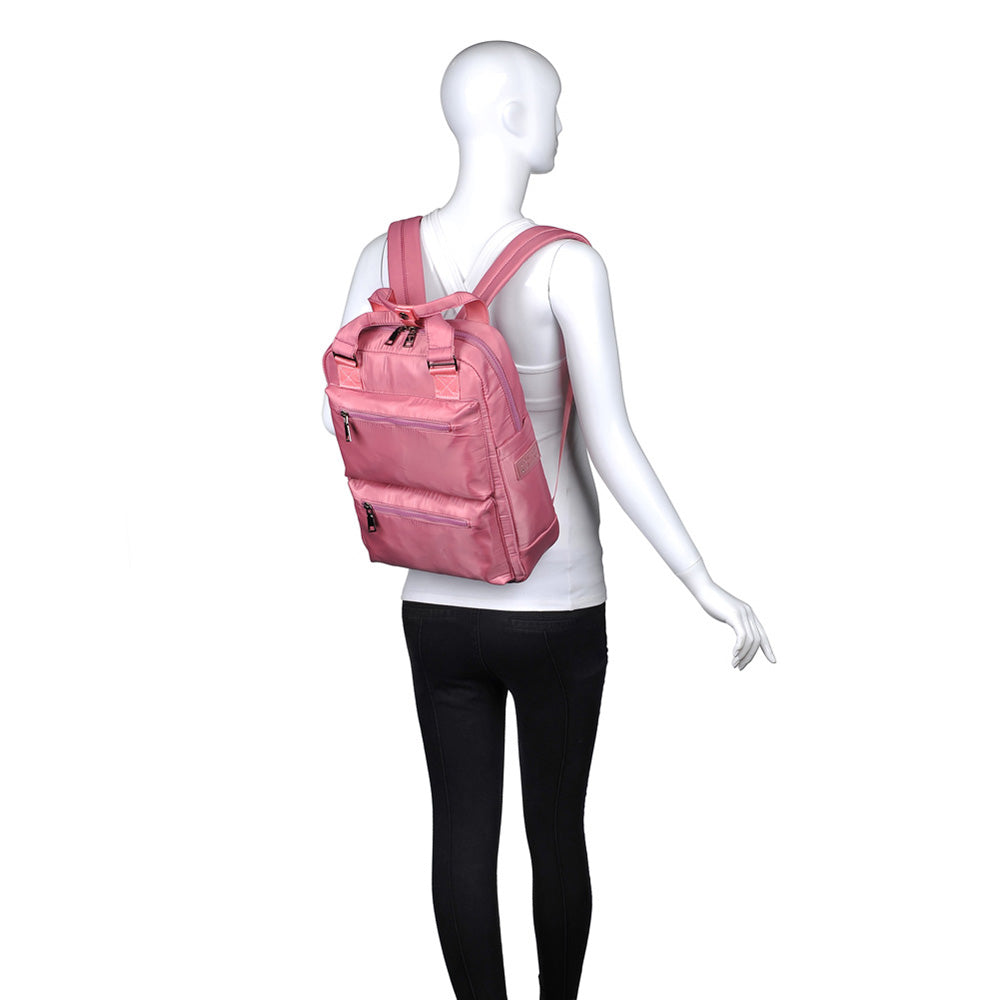 Woman wearing Blush Sol and Selene Going Places Backpack 841764102704 View 1 | Blush