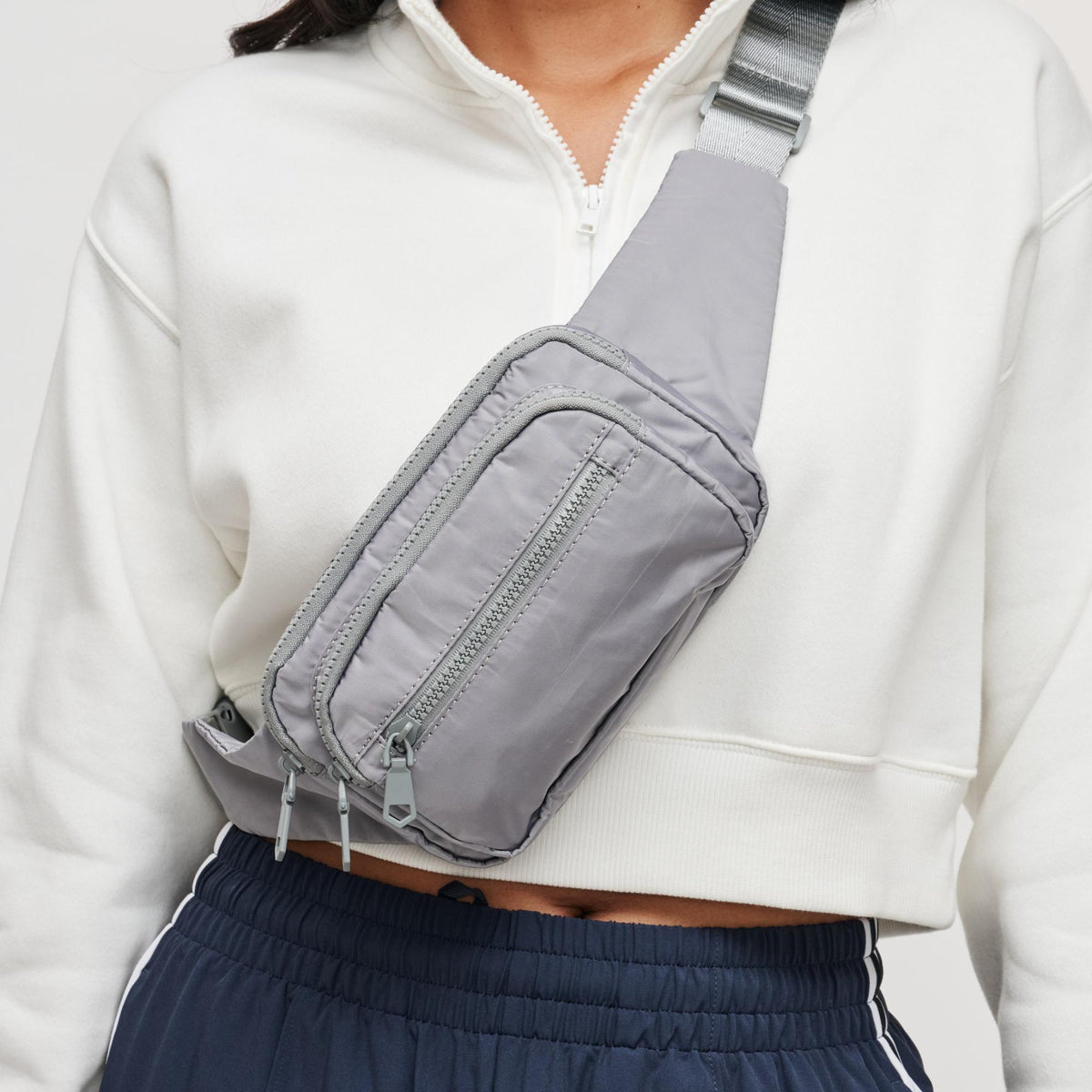Woman wearing Grey Sol and Selene Hip Hugger Belt Bag 841764103251 View 1 | Grey