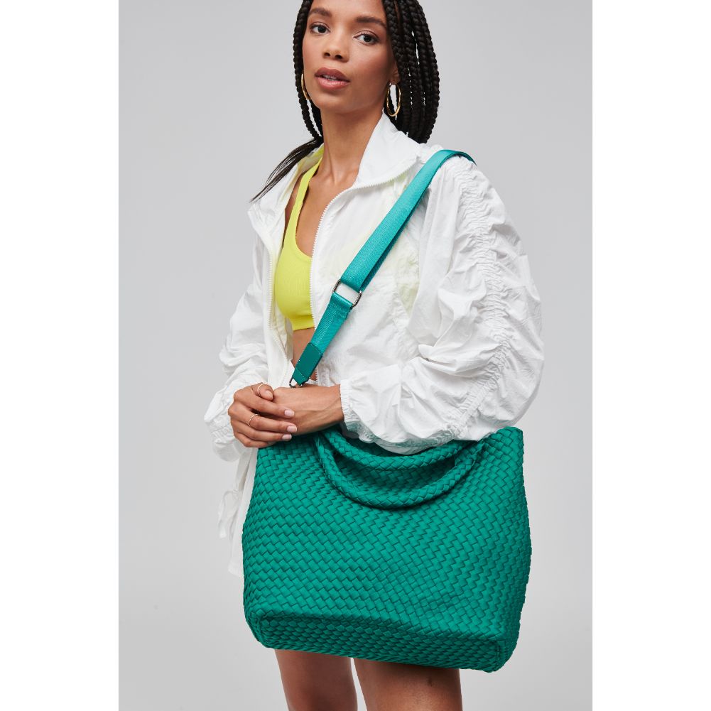 Woman wearing Emerald Sol and Selene Sky's The Limit - Medium Tote 841764107808 View 2 | Emerald