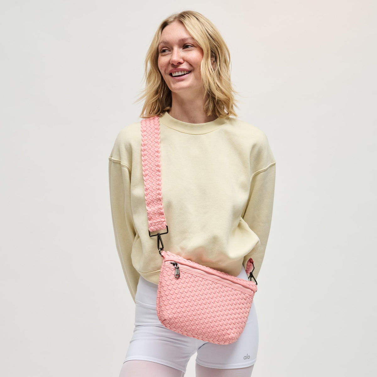 Woman wearing Blush Sol and Selene Ethereal - Woven Neoprene Crossbody 841764112376 View 1 | Blush