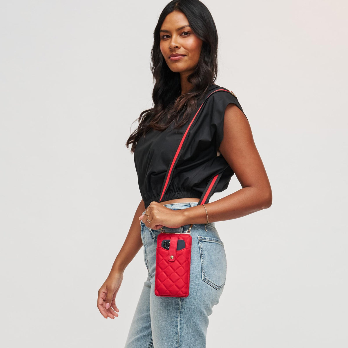 Woman wearing Red Sol and Selene Duality - Quilted Cell Phone Crossbody 840611182272 View 2 | Red