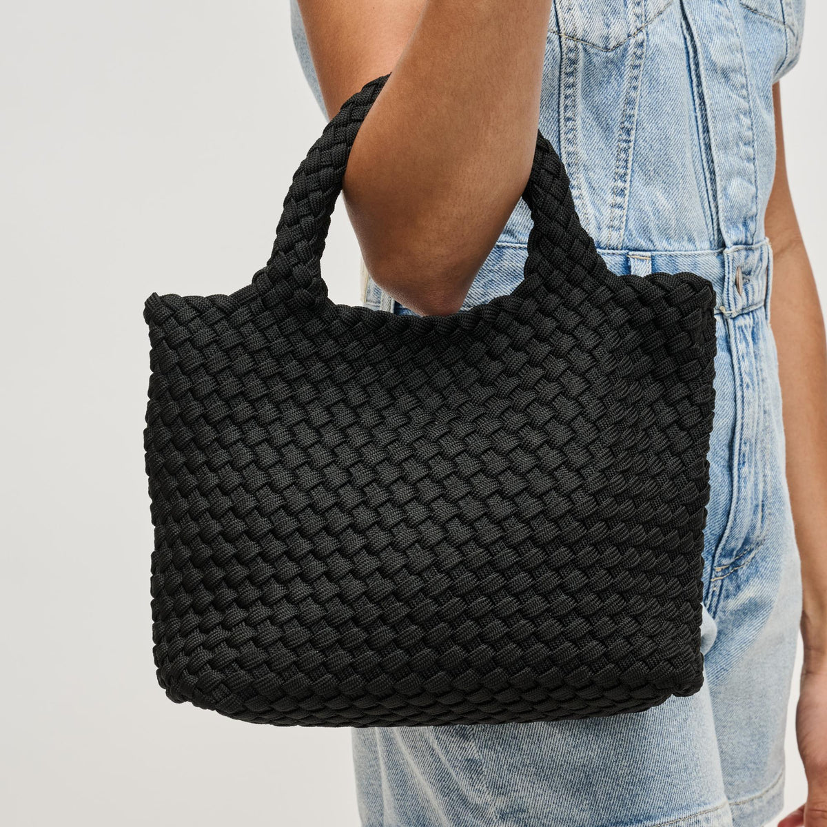 Woman wearing Black Sol and Selene Sky's The Limit - Small Laced Up Eco-Edition Crossbody 841764111690 View 4 | Black