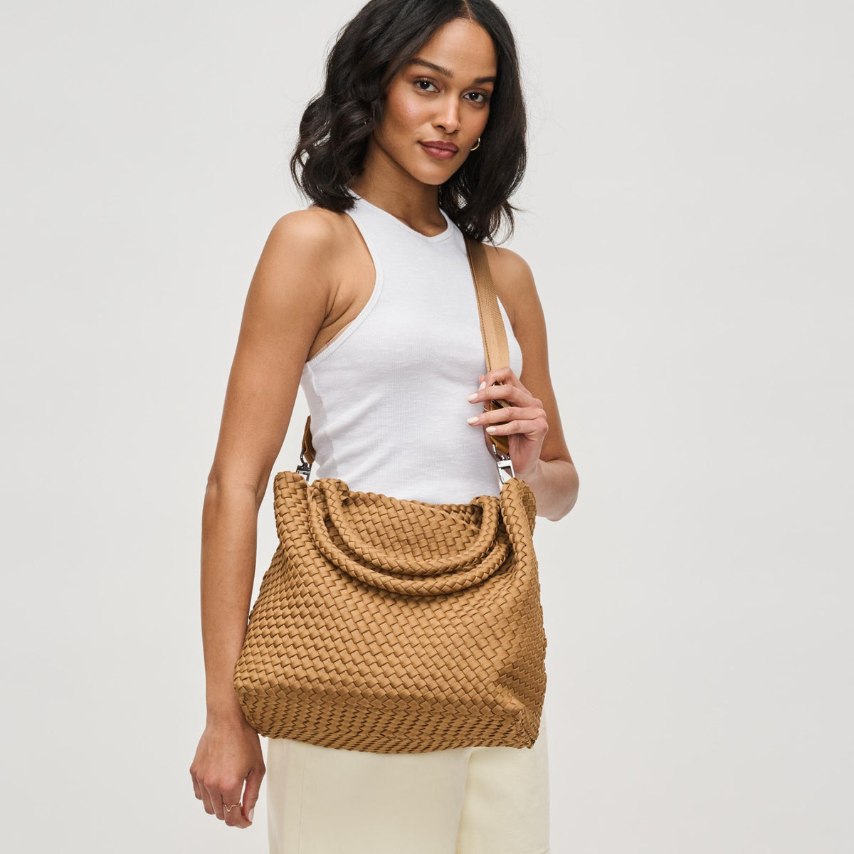 Woman wearing Sand Sol and Selene Sky's The Limit - Medium Tote 841764111324 View 3 | Sand
