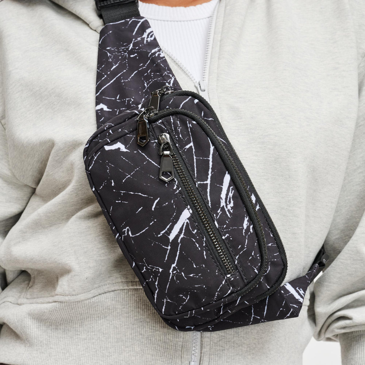 Woman wearing Black Marble Sol and Selene Hip Hugger Belt Bag 841764105804 View 1 | Black Marble