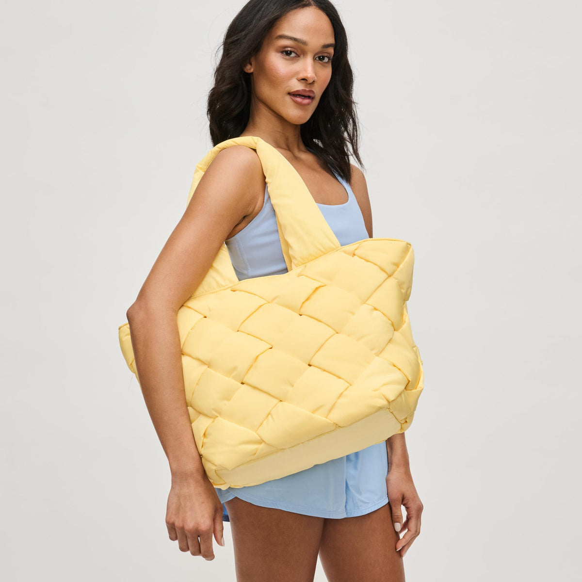 Woman wearing Butter Sol and Selene Intuition East West Tote 841764111836 View 2 | Butter