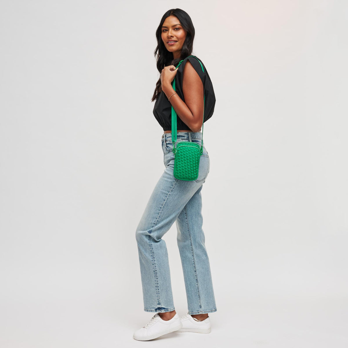 Woman wearing Kelly Green Sol and Selene Divide & Conquer - Woven Neoprene Crossbody 841764108751 View 3 | Kelly Green