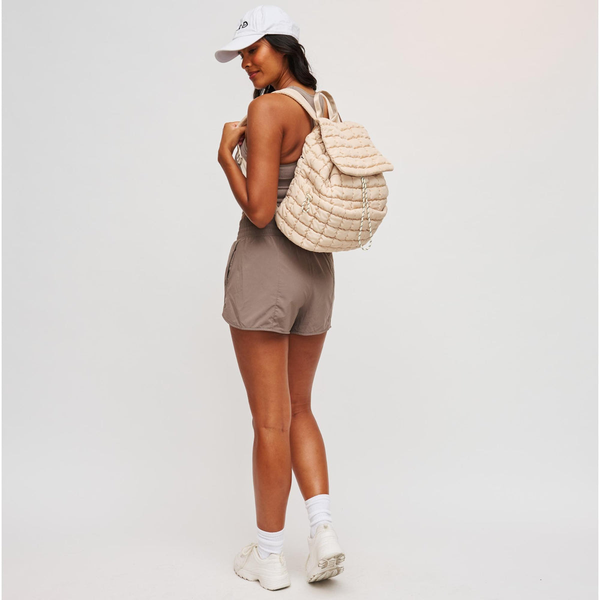 Woman wearing Cream Sol and Selene Vitality Backpack 841764109888 View 3 | Cream
