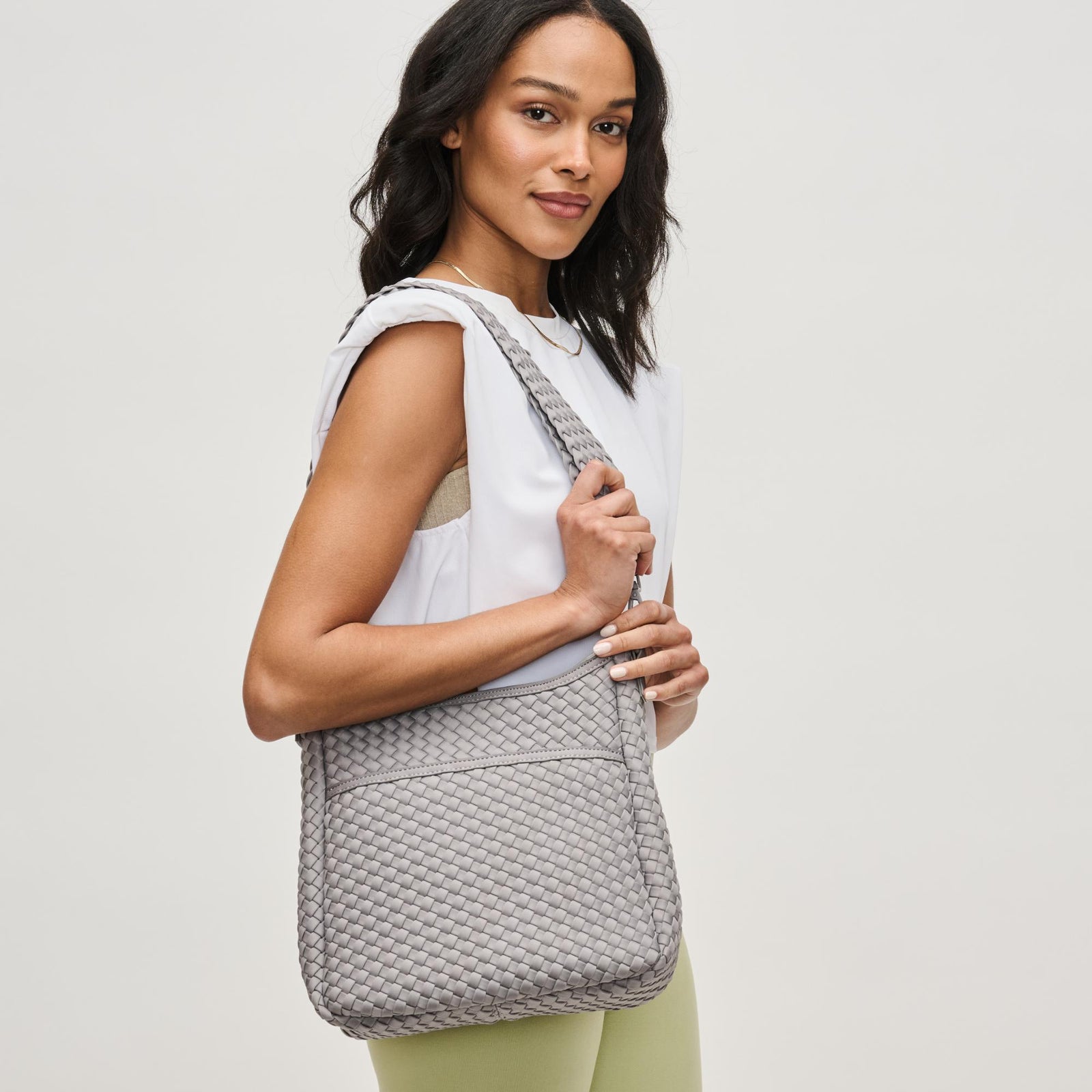 Woman wearing Black Sol and Selene Kismet - Woven Neoprene Crossbody 841764110143 View 1 | Black