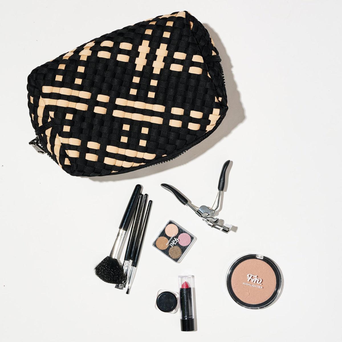 Woman wearing Black Nude Sol and Selene Altitude - Woven Neoprene Cosmetic & Travel Organizer Pouch 841764112147 View 1 | Black Nude