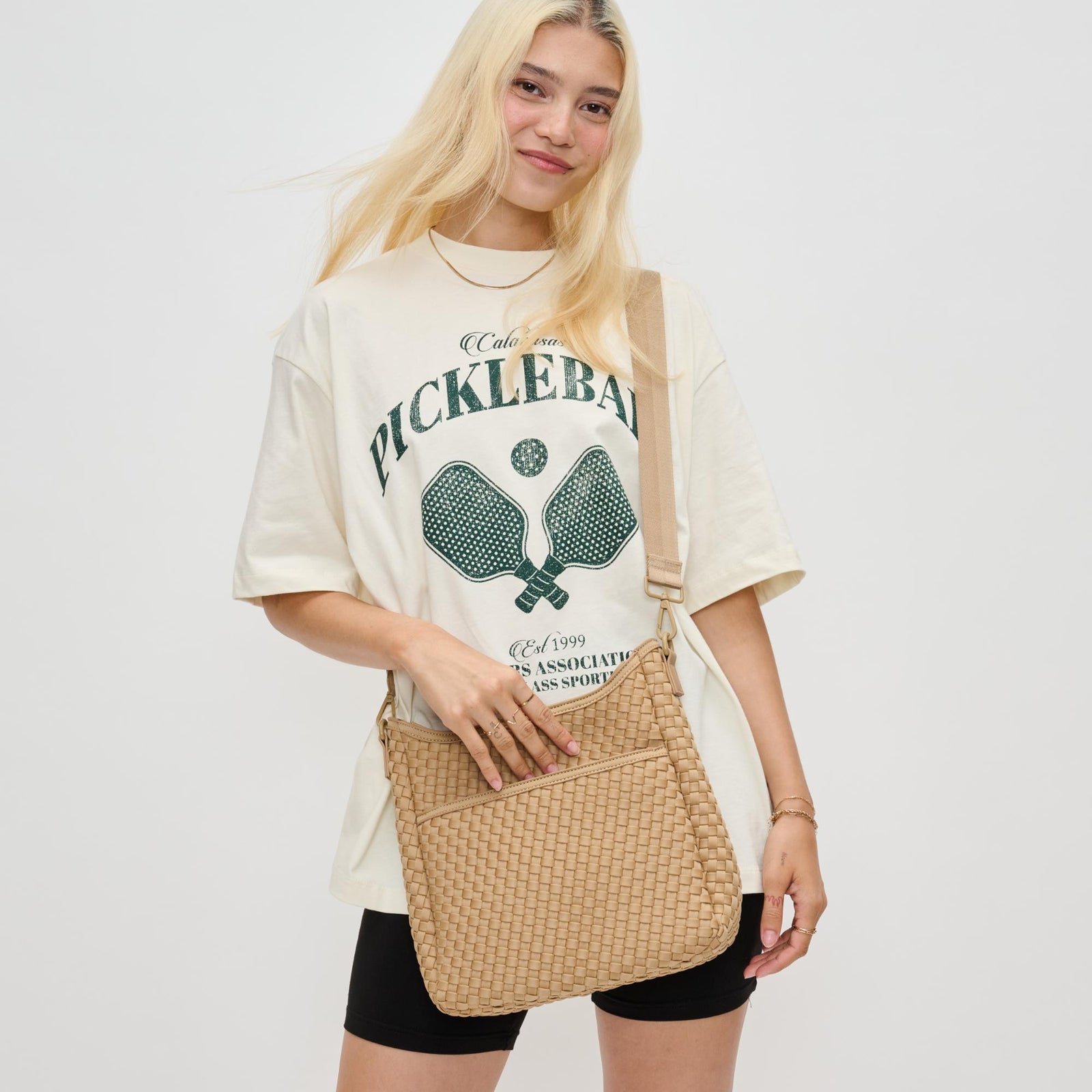 Woman wearing Black Sol and Selene Kismet - Woven Neoprene Crossbody 841764110143 View 1 | Black