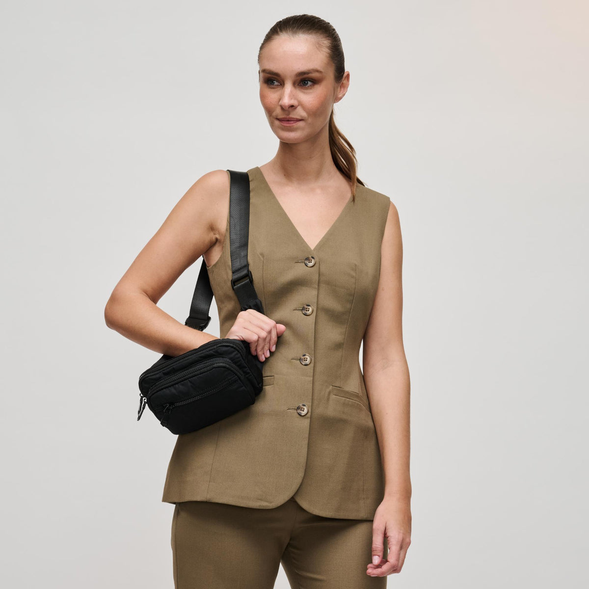 Woman wearing Black Sol and Selene Hip Hugger Belt Bag 841764102896 View 4 | Black