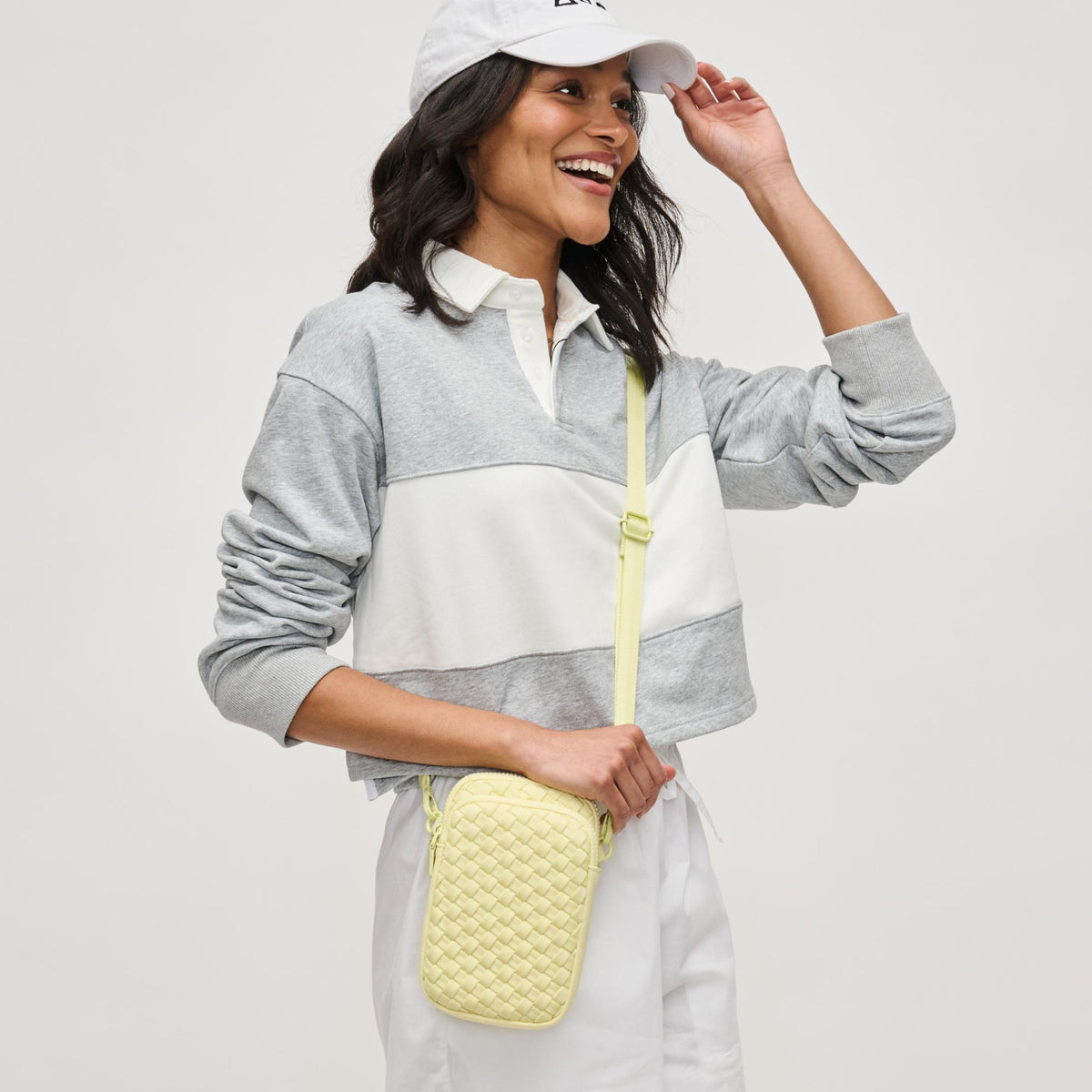 Woman wearing Butter Sol and Selene Divide & Conquer - Woven Neoprene Crossbody 841764111249 View 2 | Butter