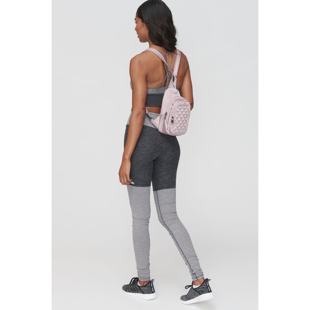 Woman wearing Blush Sol and Selene On The Run Sling Backpack 841764104418 View 2 | Blush