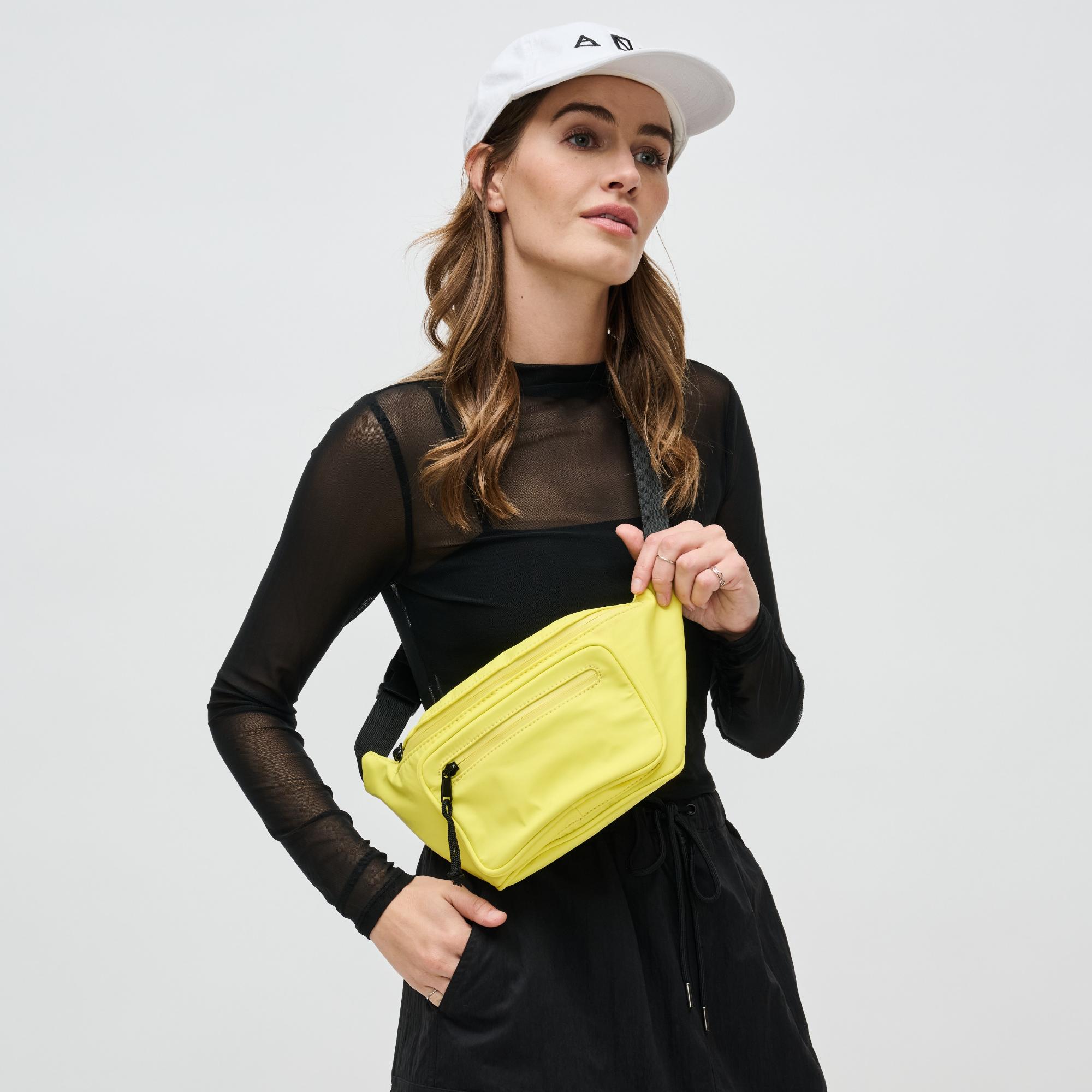 Woman wearing Black Sol and Selene Hands Down Belt Bag 841764103619 View 1 | Black