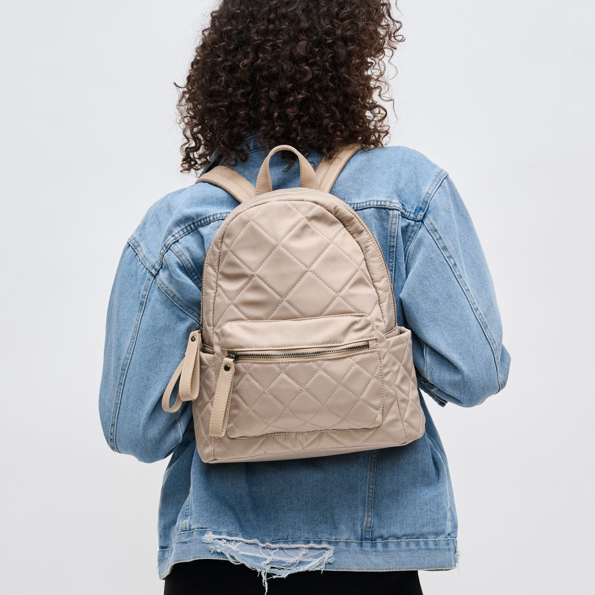 Woman wearing Nude Sol and Selene Motivator - Small Backpack 841764107693 View 1 | Nude