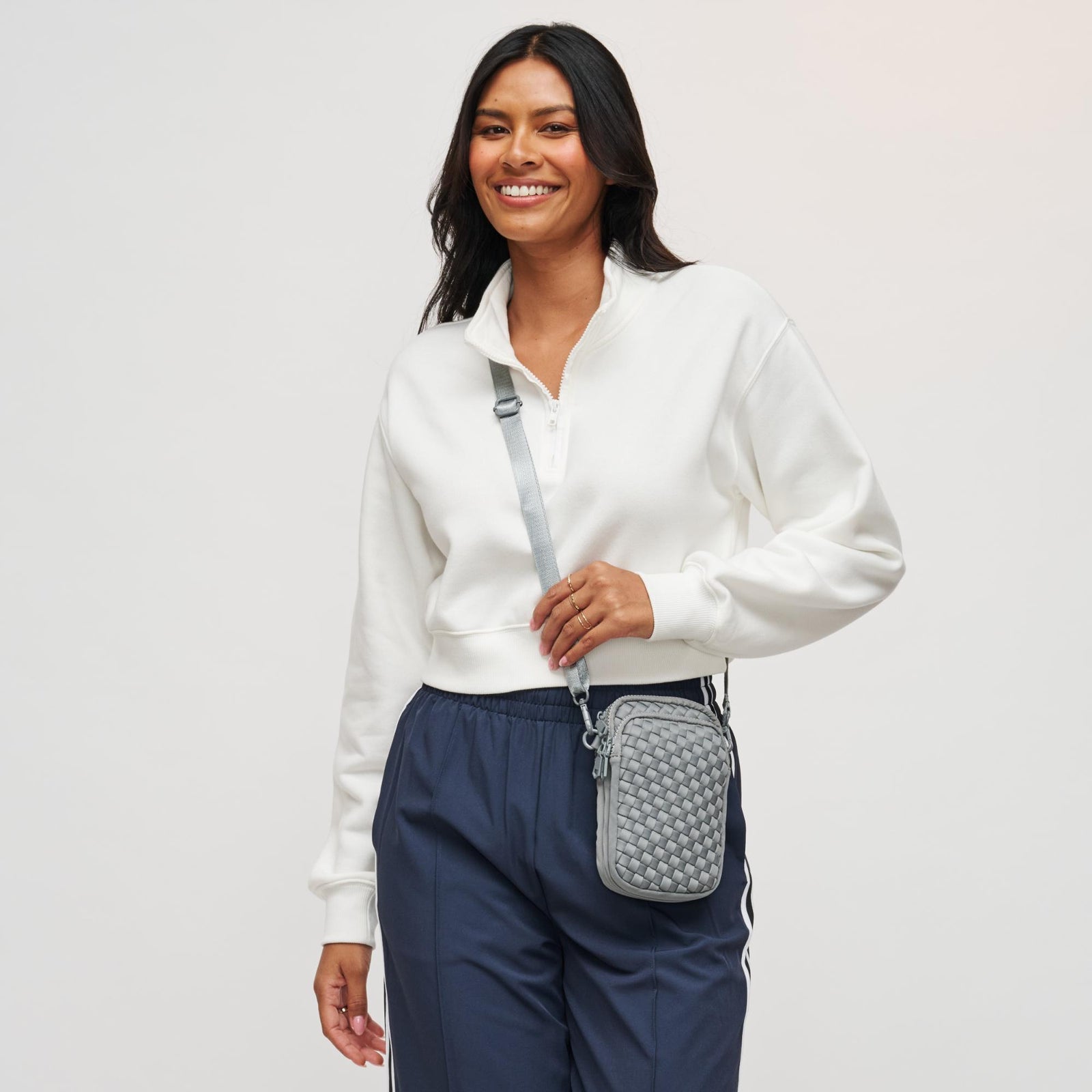 Woman wearing Black Sol and Selene Divide & Conquer - Woven Neoprene Crossbody 841764108706 View 1 | Black