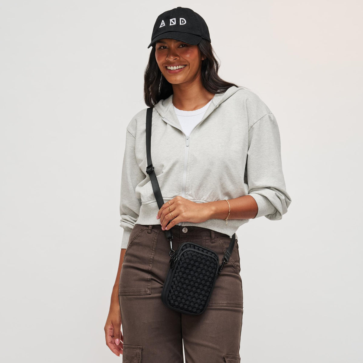 Woman wearing Black Sol and Selene Divide & Conquer - Woven Neoprene Crossbody 841764108706 View 2 | Black