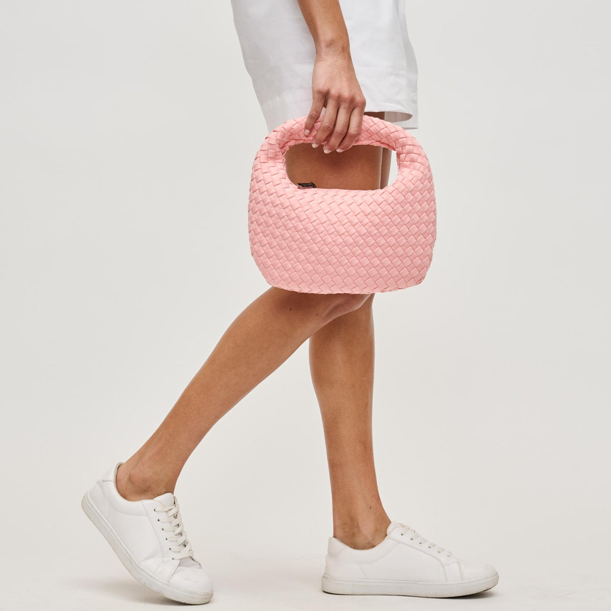 Woman wearing Blush Sol and Selene Dare to Dream - Small Woven Neoprene Clutch 841764111492 View 3 | Blush