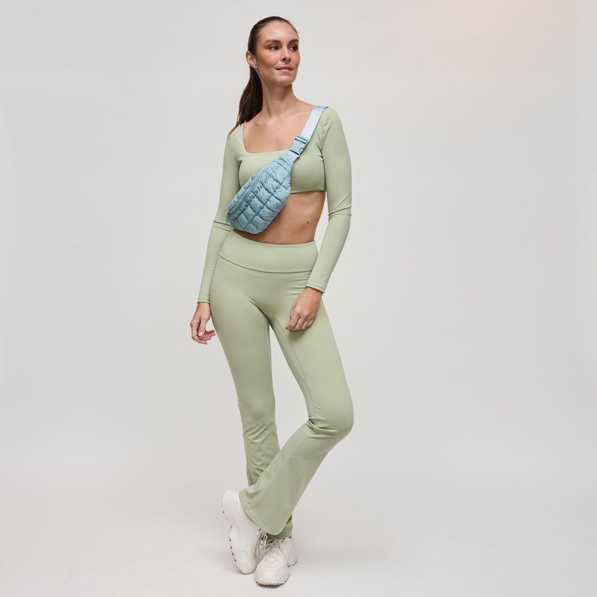 Woman wearing Sky Blue Sol and Selene Resurgence Belt Bag 841764109659 View 2 | Sky Blue