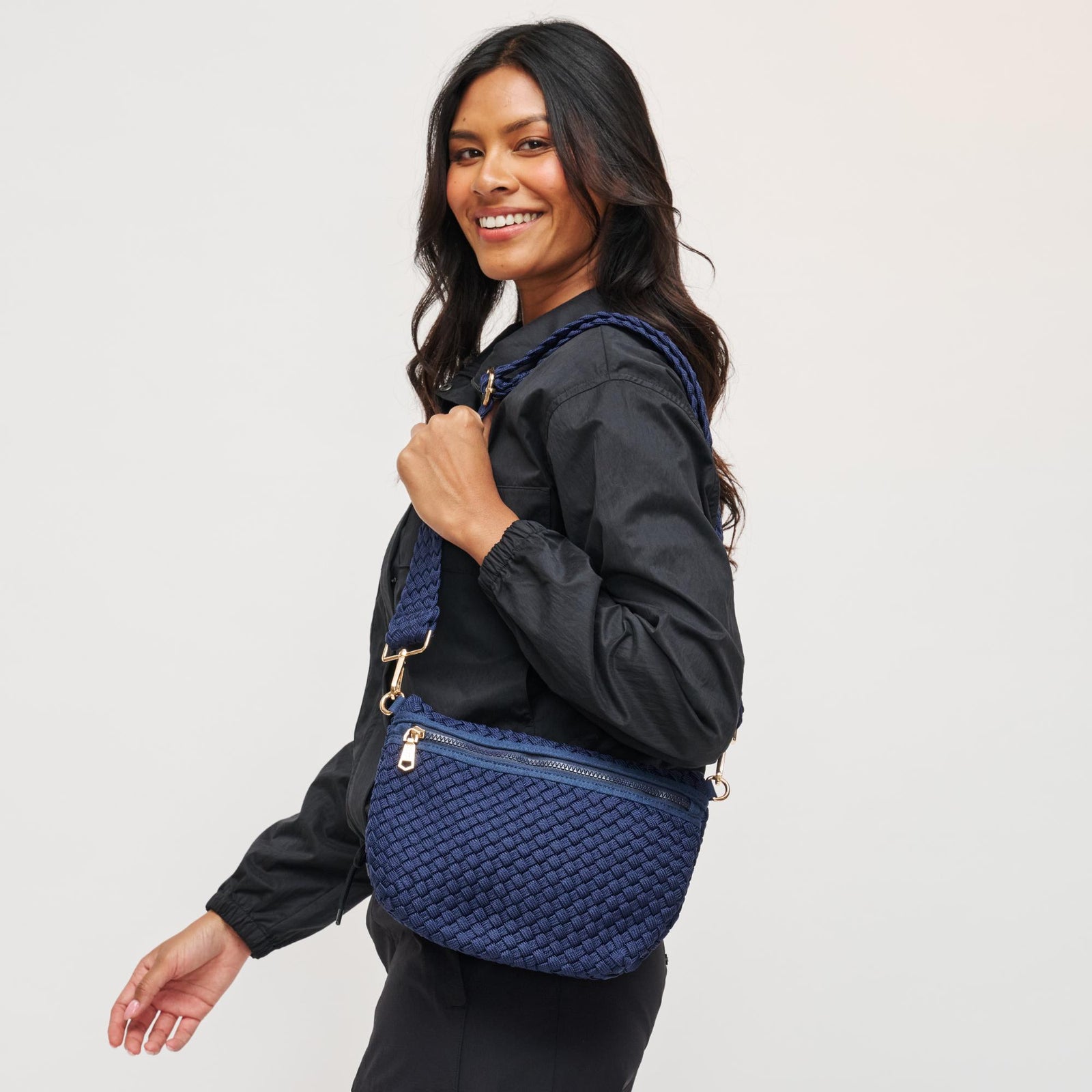 Woman wearing Black Sol and Selene Ethereal - Woven Laced Up Eco-Edition Crossbody 841764111539 View 1 | Black